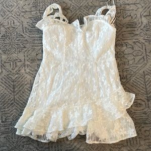 Adorable white romper perfect for any bridal occasion